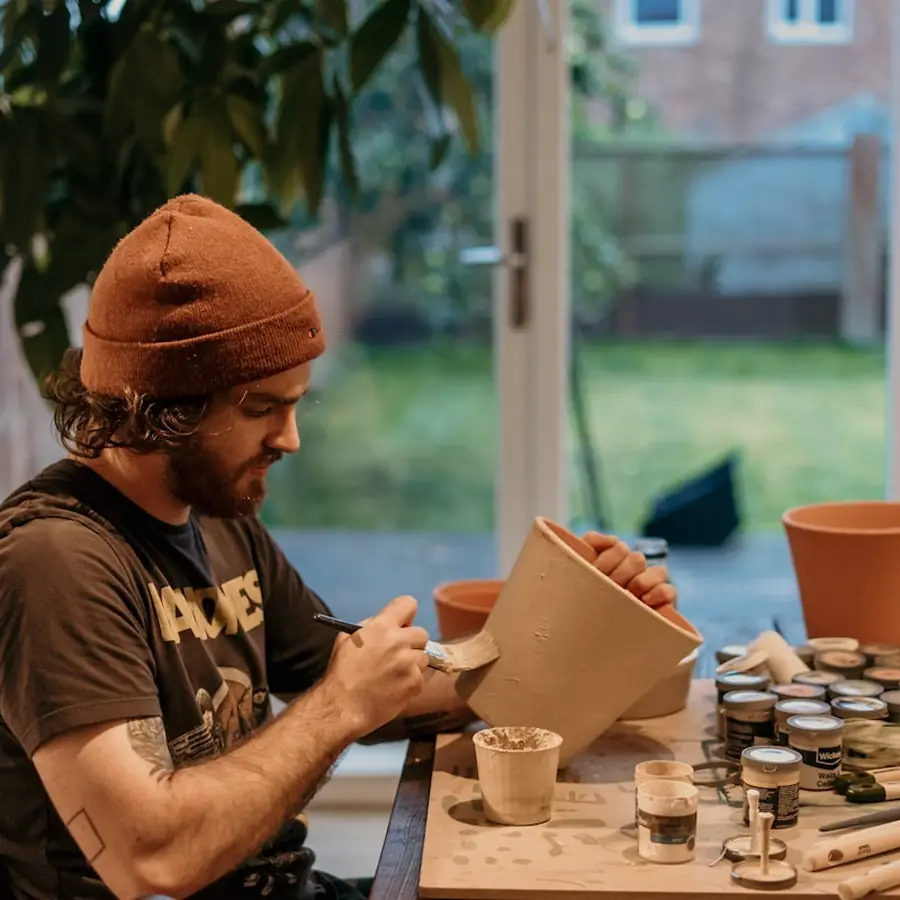 Hand thrown pots on a work table